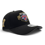 Black 2025-2026 New York Knicks Champions Curved Visor Gray Bottom Trophy Side Patch New Era 9Forty Snapback