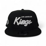 Black Los Angeles Kings Gray Bottom Kings Logo Side Patch New Era 9Fifty Snapback