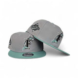 Gray Florida Marlins Mint Green Visor Gray Bottom 1997 World Series Side Patch New Era 9Fifty Snapback