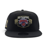 Black 2025-2026 New York Knicks Champions Gray Bottom Trophy Side Patch New Era 9Fifty Snapback