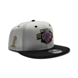 White 2025-2026 New York Knicks Champions Black Visor Gray Bottom Trophy Side Patch New Era 9Fifty Snapback