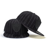 Black Las Vegas Raiders Pinstripe New Era Metal Badge 9Fifty Snapback