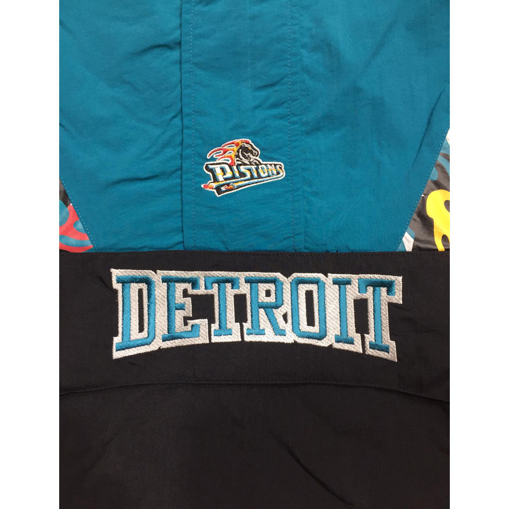 https://exclusivefitted.com/cdn/shop/products/Mitchell-Ness-Half-Zip-Anorak-NBA-Black-Detroit-Pistons-Windbeaker-Jacket-4.jpg?v=1595101401