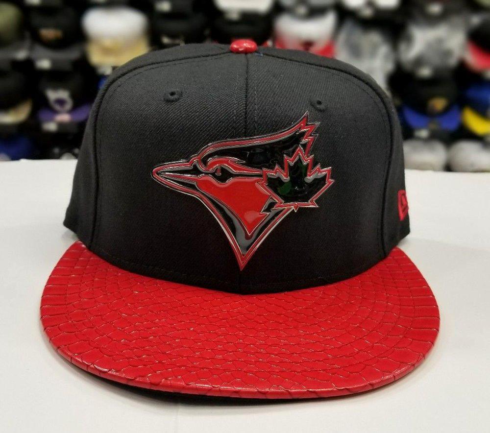 New Era 950 MLB Toronto Blue Jays Black / Red Metal Badge Strapback Hat Snapback